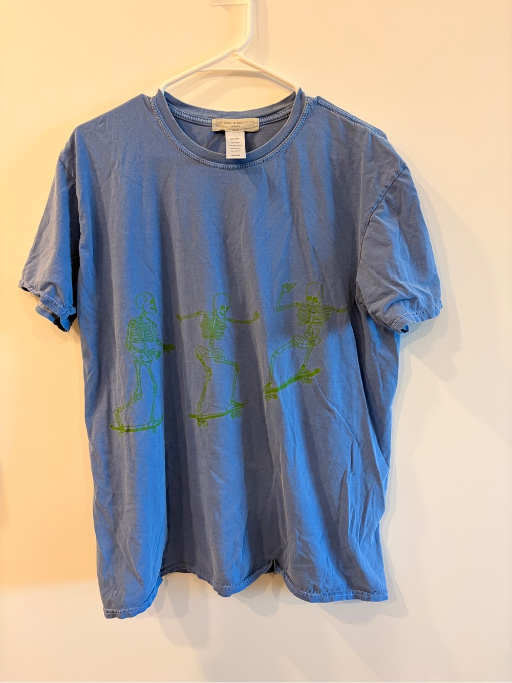 Project Social T Blue Short Sleeve Tee with Green Skeleton Skateboard Graphic